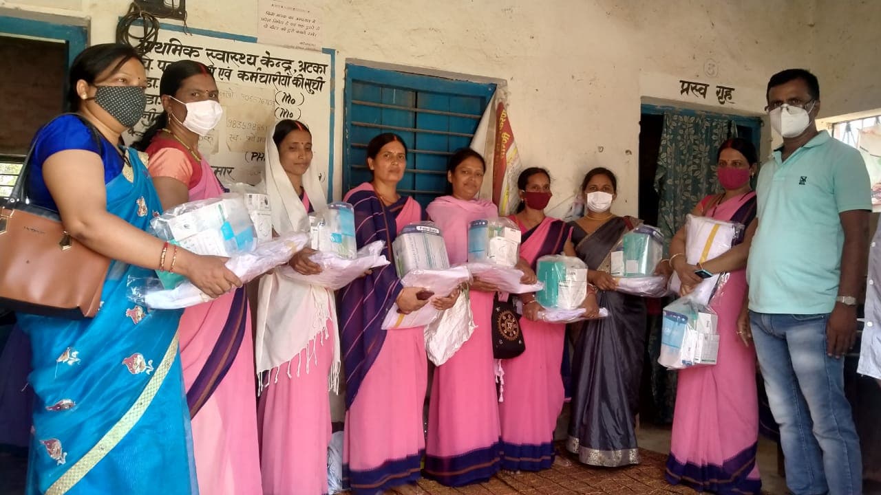 Community health camp providing healthcare services in a rural village
